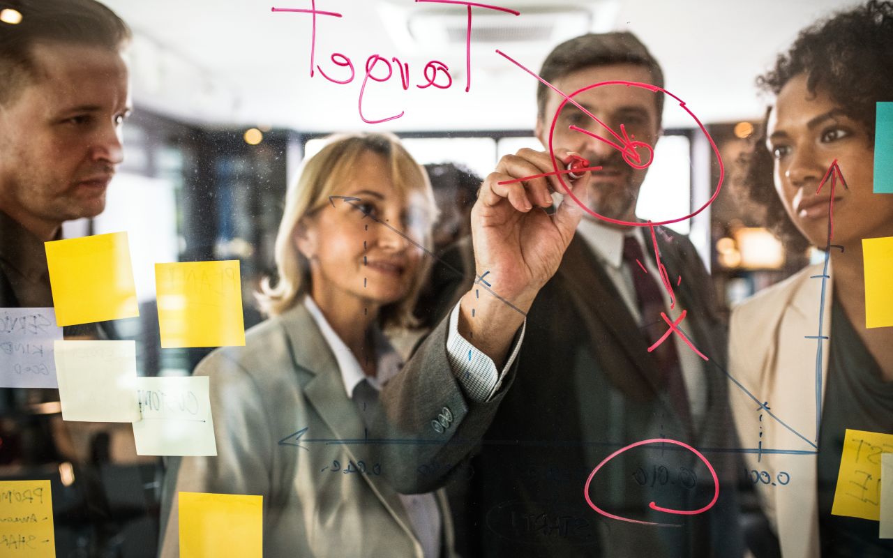 John Doerr discussing the impact of the OKR framework in business with OKRs, inspired by Andy Grove's methods.